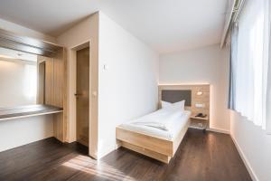 Postel nebo postele na pokoji v ubytování Landhotel Traube