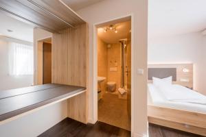Postel nebo postele na pokoji v ubytování Landhotel Traube
