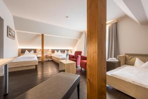 Postel nebo postele na pokoji v ubytování Landhotel Traube