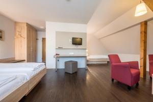 Postel nebo postele na pokoji v ubytování Landhotel Traube