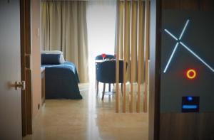 Postel nebo postele na pokoji v ubytování Extenso Hotel