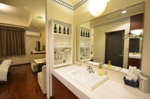 Ванна кімната в HOTEL SOLA chikugo MOTEL