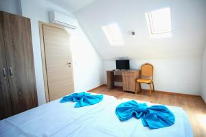 Postel nebo postele na pokoji v ubytování Hotel Elitza