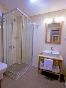 a bathroom with a shower and a sink at Hotel Momento - Special Category in Istanbul