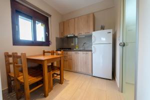 Kuchyňa alebo kuchynka v ubytovaní Villa Diamantis Apartments