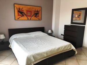 Ένα ή περισσότερα κρεβάτια σε δωμάτιο στο La Casa di Pedro