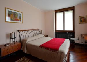 Postel nebo postele na pokoji v ubytování Villa Onorina