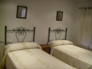 Letto o letti in una camera di Hotel Delphos
