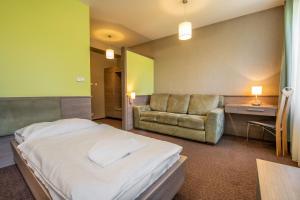 Uma área de estar em Hotel Lučivná