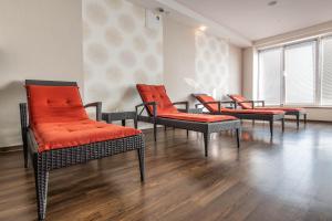 Uma área de estar em Hotel Lučivná