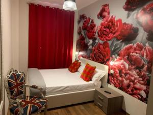 Postel nebo postele na pokoji v ubytování Rigoletto Rental Rooms