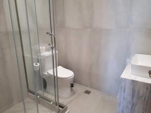 Ein Badezimmer in der Unterkunft Hotel Ionion