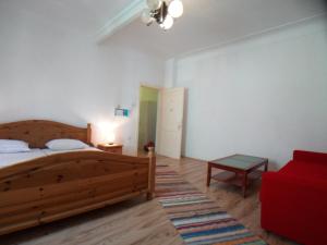 Postel nebo postele na pokoji v ubytování City Castle Lussin