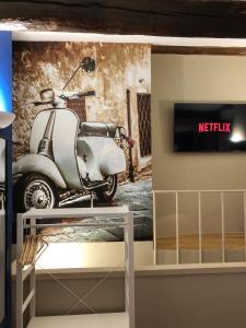 TV a/nebo společenská místnost v ubytování Hotel Domus Tiberina