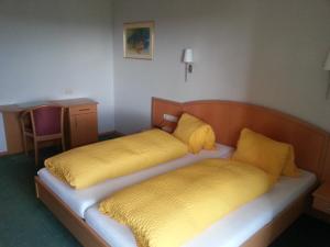 Postel nebo postele na pokoji v ubytování eckbergerhof