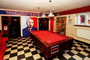 A pool table at Good Bye Lenin Pub & Garden Hostel
