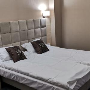 Ένα ή περισσότερα κρεβάτια σε δωμάτιο στο Hotel Sevilla Gold +24 φωτογραφίες