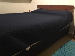 Un pat sau paturi într-o cameră la habitaciones exclusivas