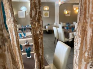 Posezení v ubytování Hôtel Restaurant L' Empereur