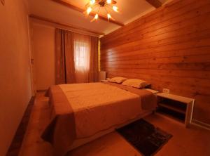 En eller flere senge i et værelse på садиба Пан Коцький
