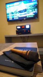 a pen sitting on top of a notebook on a table at ParmView Inn in Legazpi