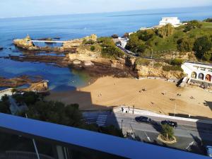 a view of a beach next to the ocean at AGTBAB in Biarritz