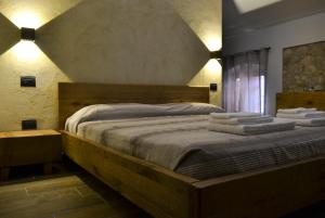 A bed or beds in a room at Agriturismo Tamellini