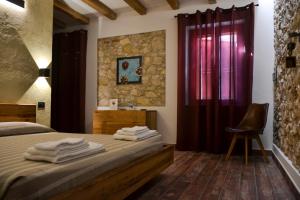 A bed or beds in a room at Agriturismo Tamellini