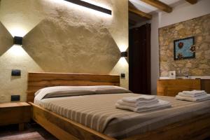 A bed or beds in a room at Agriturismo Tamellini