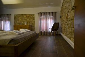A bed or beds in a room at Agriturismo Tamellini