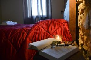 A bed or beds in a room at Agriturismo Tamellini