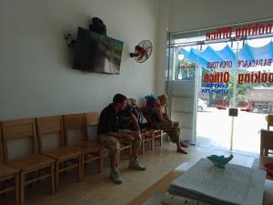a group of people sitting in a waiting room at Cat Ba Valentine in Cat Ba