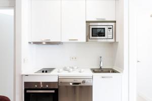 Kuchyň nebo kuchyňský kout v ubytování Genteel Home Mateos Gago