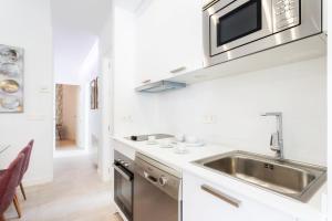 Kuchyň nebo kuchyňský kout v ubytování Genteel Home Mateos Gago