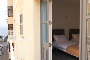 Una cama o camas en una habitación de AM Hostel