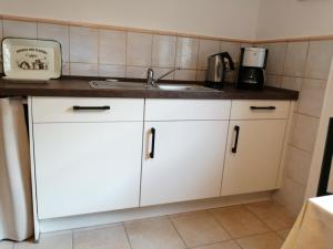 Kuchyň nebo kuchyňský kout v ubytování Ferienwohnung Ulbrich