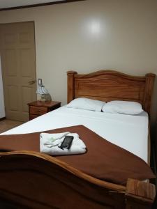 מיטה או מיטות בחדר ב-Hospedaje Yaldai