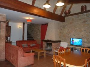 A seating area at Casas del parador - Abadía