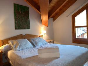 A bed or beds in a room at BPIRINEOS-Estós