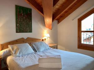 A bed or beds in a room at BPIRINEOS-Estós