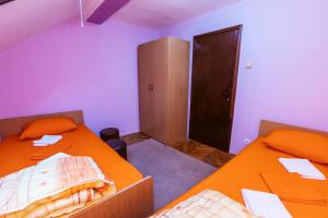 Letto o letti in una camera di Laufer