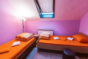 Letto o letti in una camera di Laufer