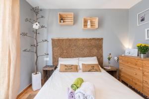 Łóżko lub łóżka w pokoju w obiekcie Apartamento "soñac sol"