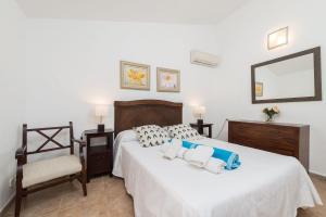 A bed or beds in a room at Finca Coster