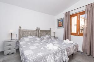 Ein Bett oder Betten in einem Zimmer der Unterkunft S Olivera