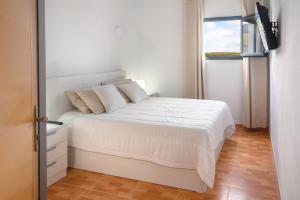 Кровать или кровати в номере Apartamento Ye
