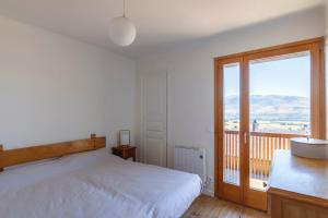Postel nebo postele na pokoji v ubytování Fantástica casa de diseño en Alp
