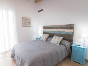 Postel nebo postele na pokoji v ubytování Villa De Lujo Frente A La Playa