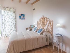 Postel nebo postele na pokoji v ubytování Villa De Lujo Frente A La Playa
