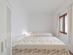 A bed or beds in a room at Casa Convent